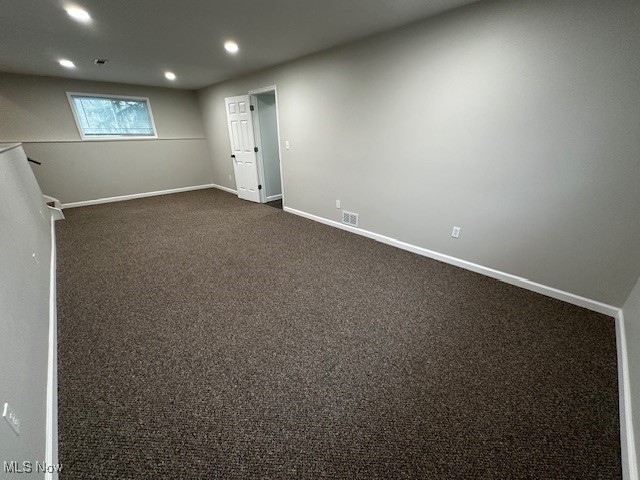 9109 Johnnycake Ridge Road Mentor, OH 44060 - Photo 22 of 28 Carpeted empty room featuring recessed lighting and baseboards