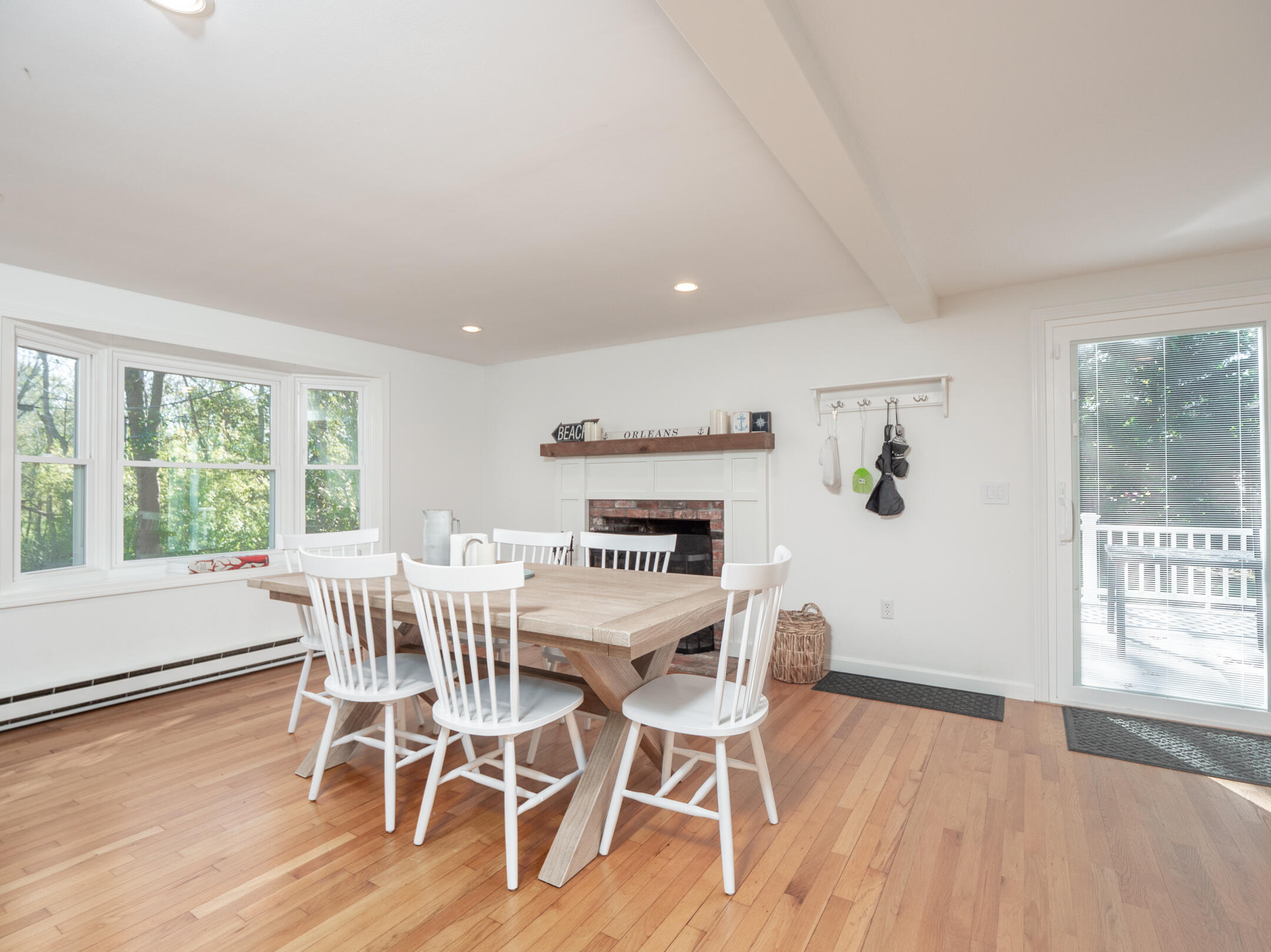 31 Childs Homestead Road Orleans, MA 02653 - Photo 8 of 32 a view of a dining room with furniture and wooden floor
