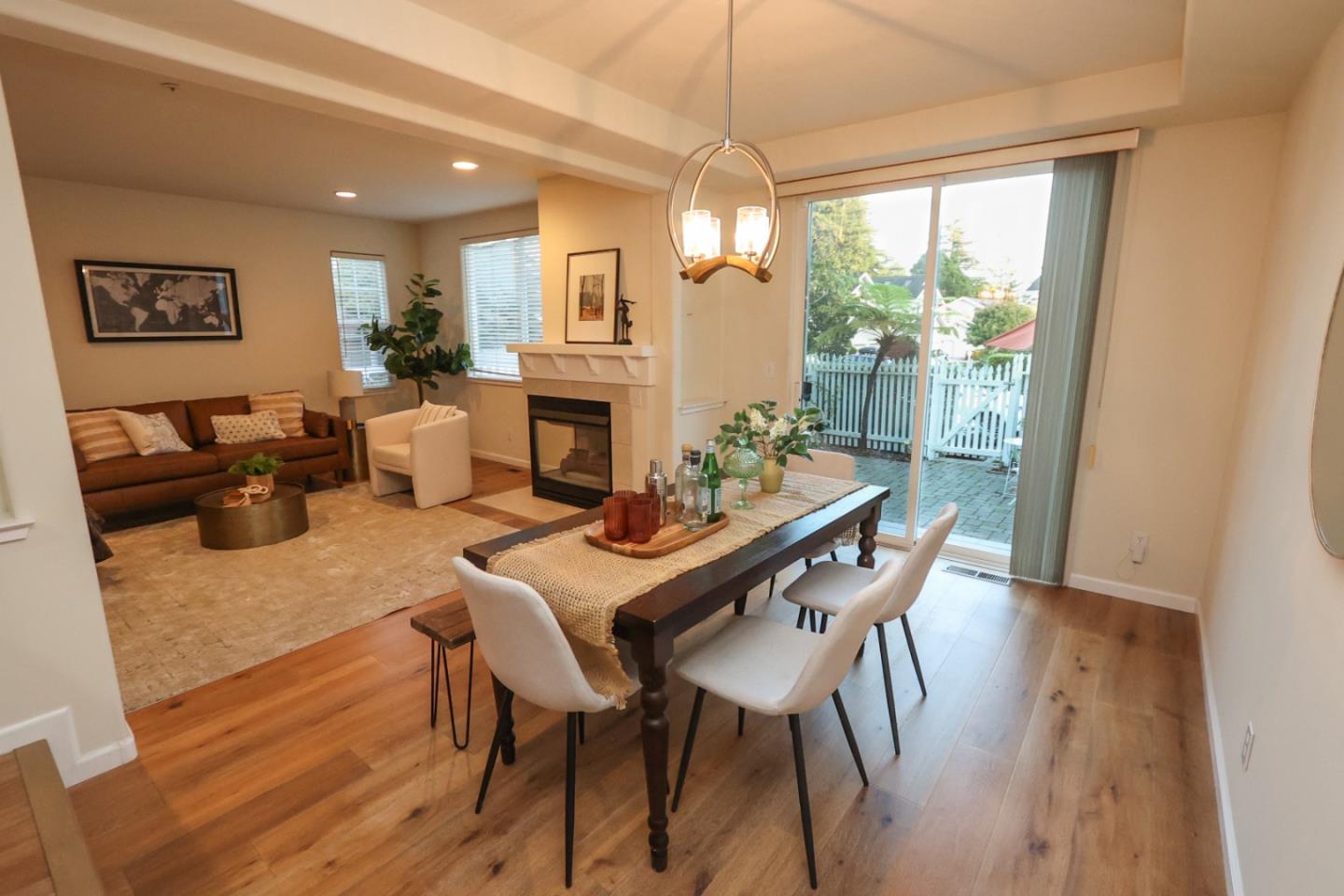 3372 Aptos Rancho Road Aptos, CA 95003 - Photo 13 of 40 a view of a dining room with furniture window and wooden floor