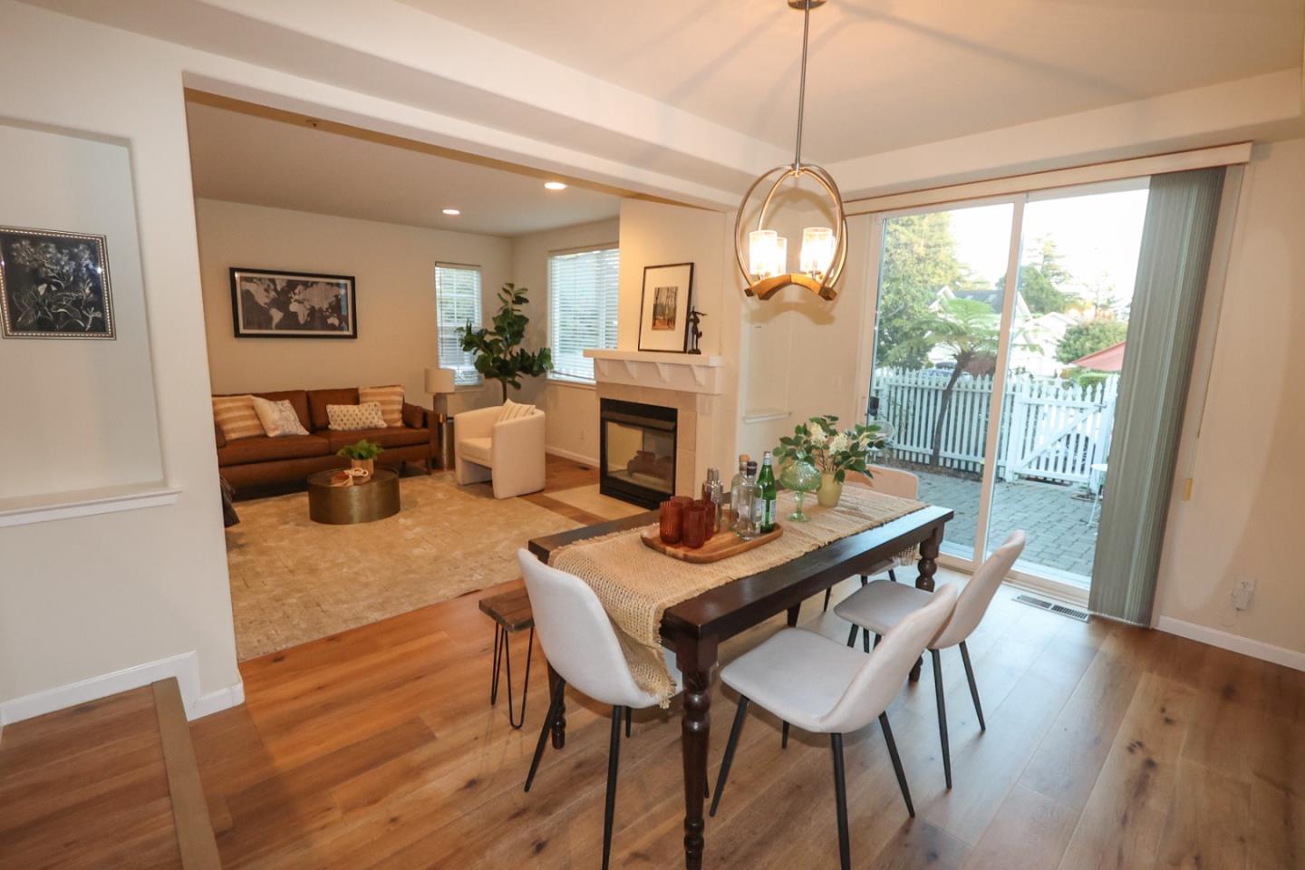 3372 Aptos Rancho Road Aptos, CA 95003 - Photo 16 of 40 a dining room with furniture window wooden floor