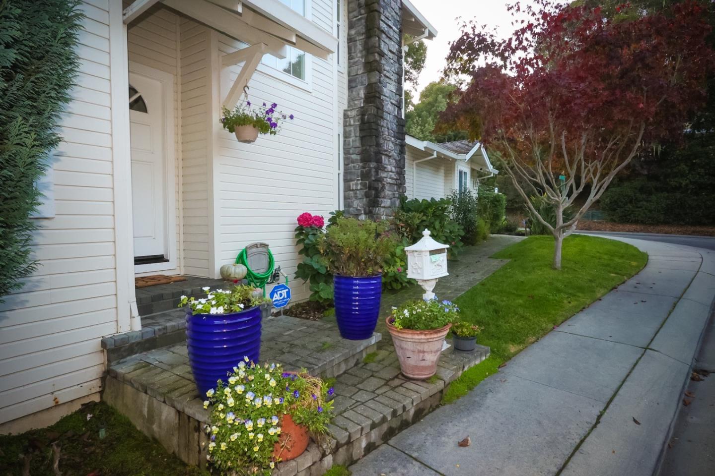 3372 Aptos Rancho Road Aptos, CA 95003 - Photo 3 of 40 a front view of a house with a garden