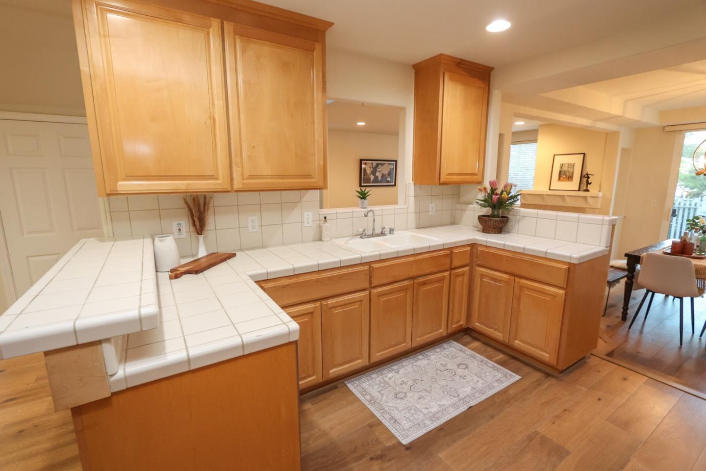 3372 Aptos Rancho Road Aptos, CA 95003 - Photo 9 of 40 a kitchen with a sink and cabinets