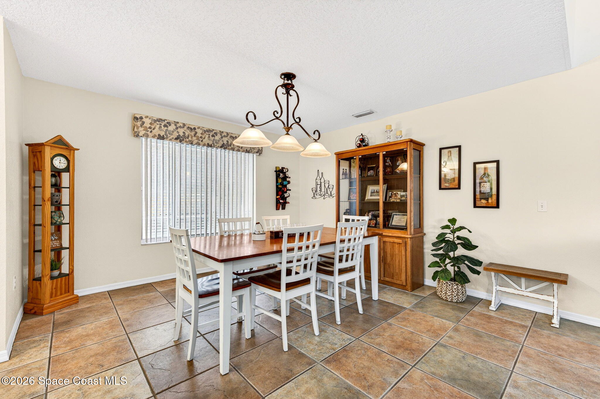 3969 Ridgewood Drive Titusville, FL 32796 - Photo 11 of 34 a dining room with furniture and window