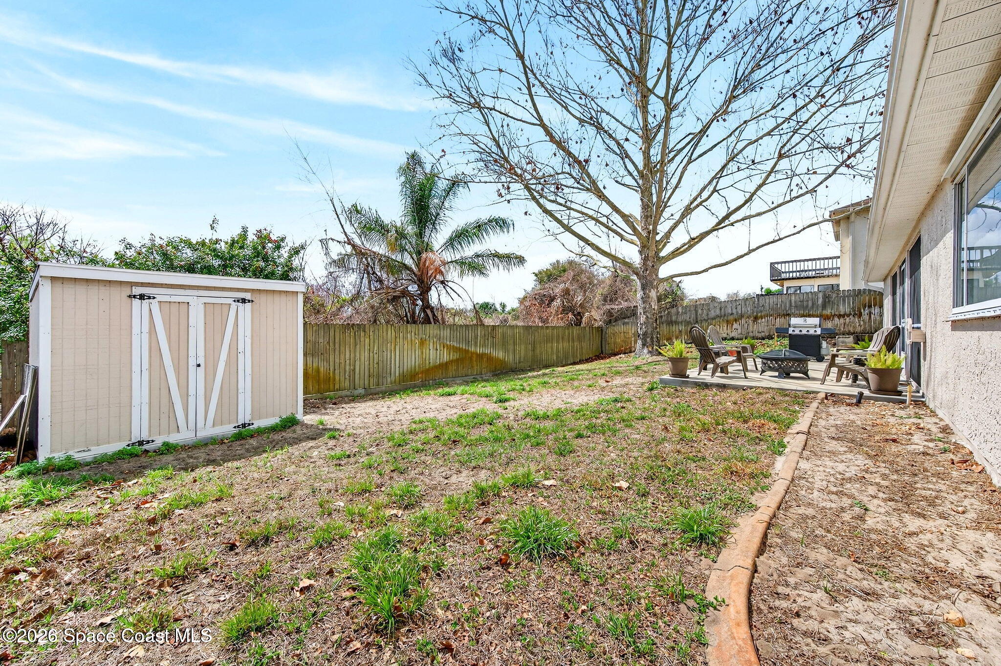 3969 Ridgewood Drive Titusville, FL 32796 - Photo 29 of 34 a view of yard with large tree