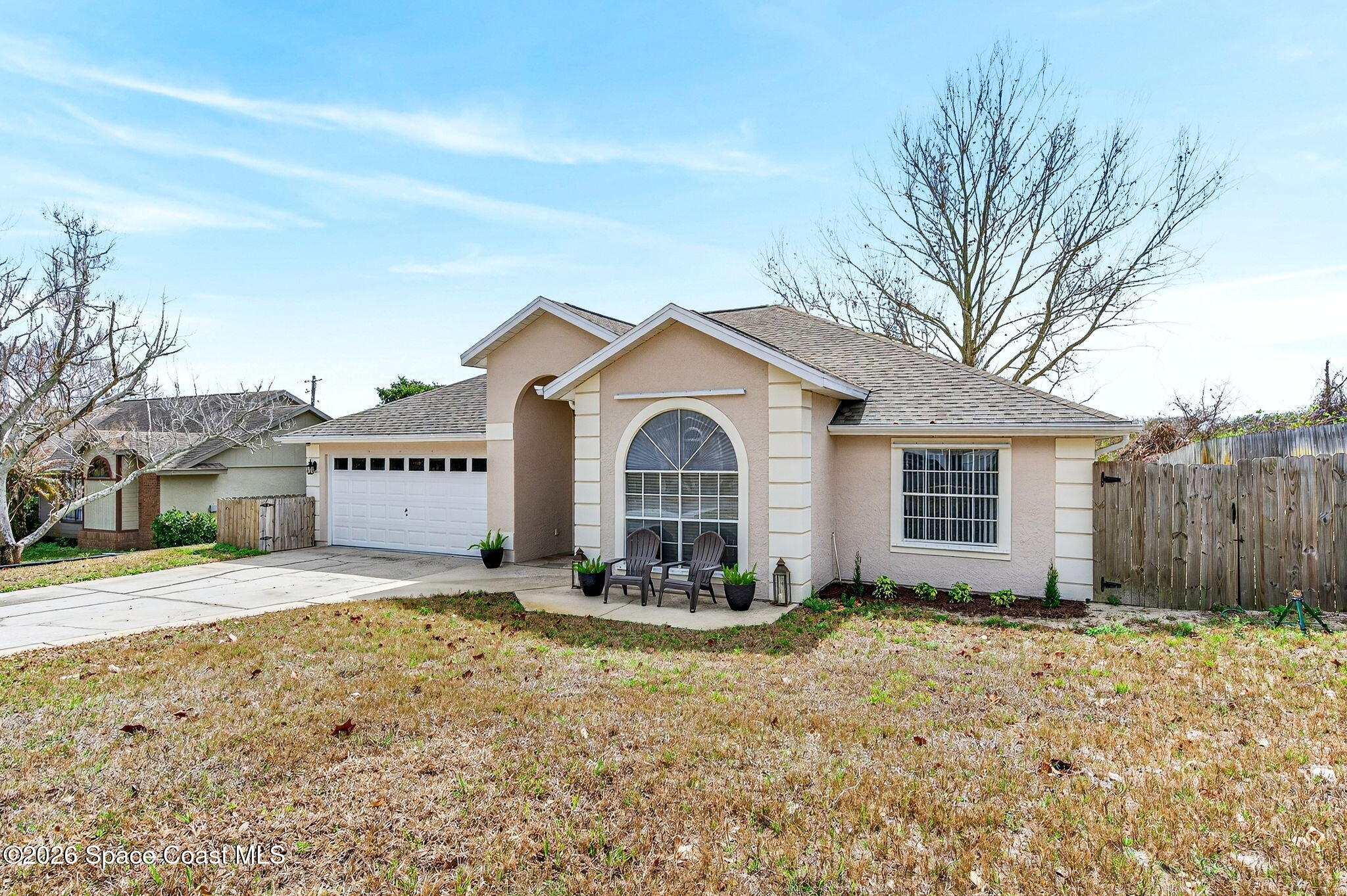 3969 Ridgewood Drive Titusville, FL 32796 - Photo 34 of 34 a view of a house with a yard