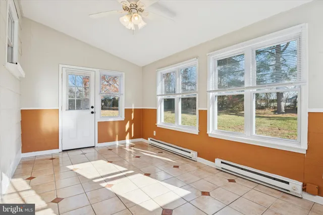 a workspace with furniture and a window