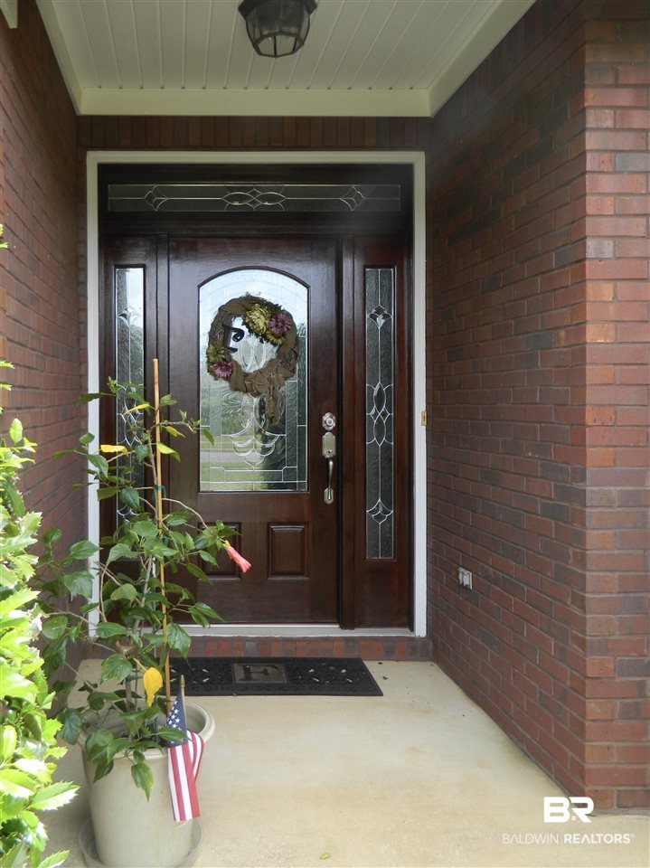 3990 Symphony Way West Semmes, AL 36575 - Photo 3 of 45 Greet your guest on the covered front porch
