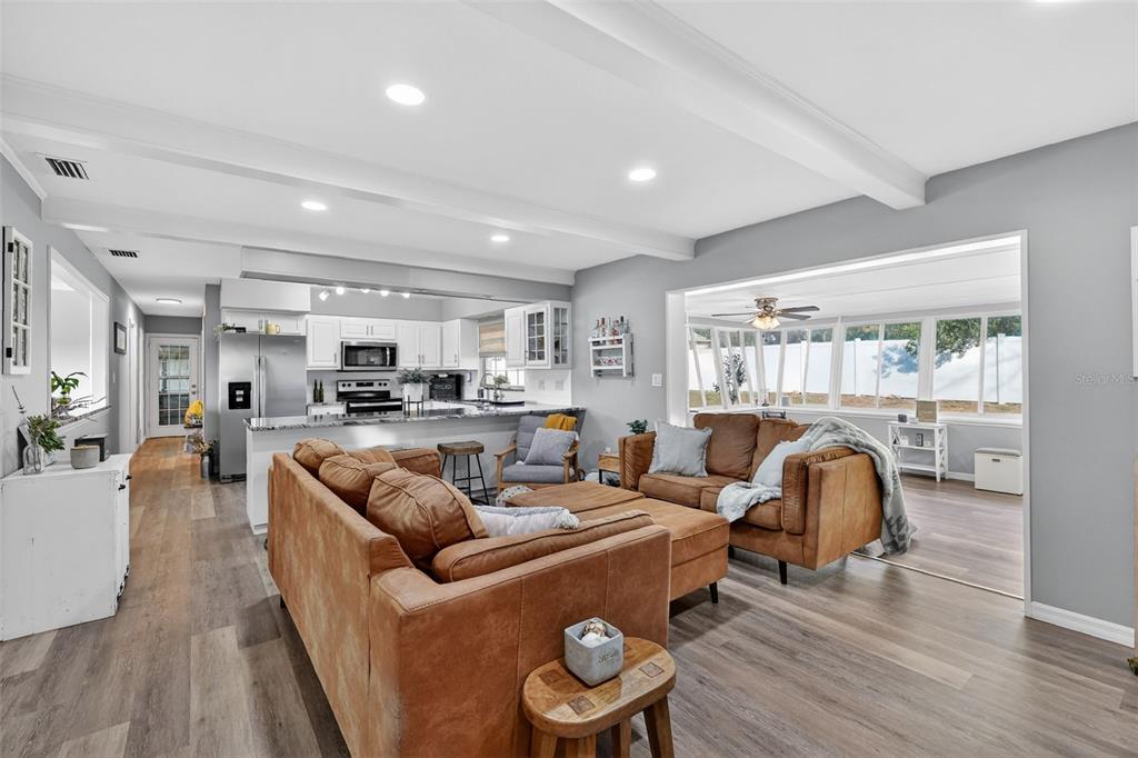1101 Country Club Road Eustis, FL 32726 - Photo 13 of 44 a living room with furniture and a large window