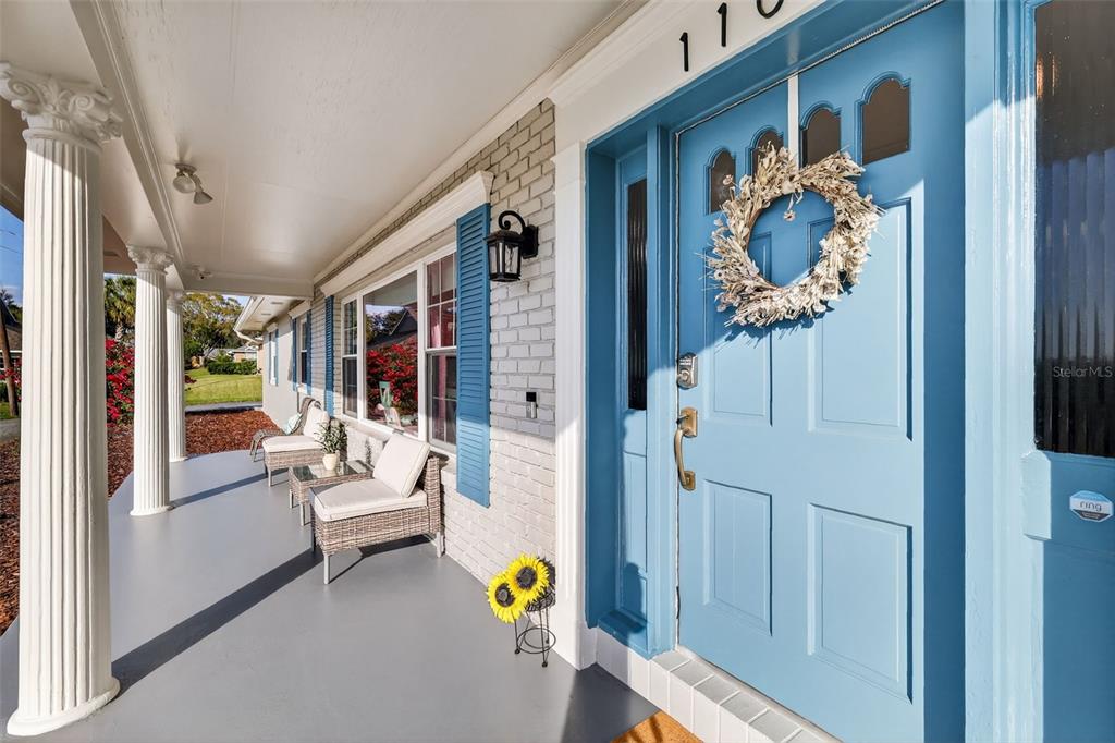 1101 Country Club Road Eustis, FL 32726 - Photo 5 of 44 a view of living room with furniture and a large window