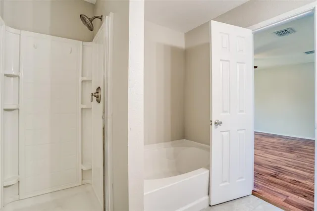 a bathroom with a bathtub