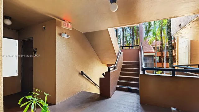 a view of balcony with furniture