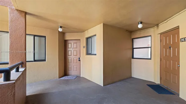 a view of livingroom with hardwood floor and hallway