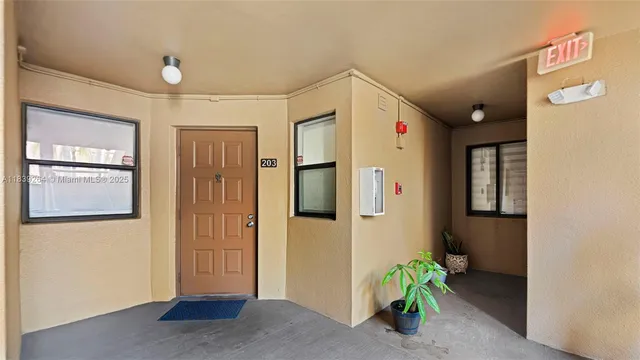 a view of a hallway with closet area