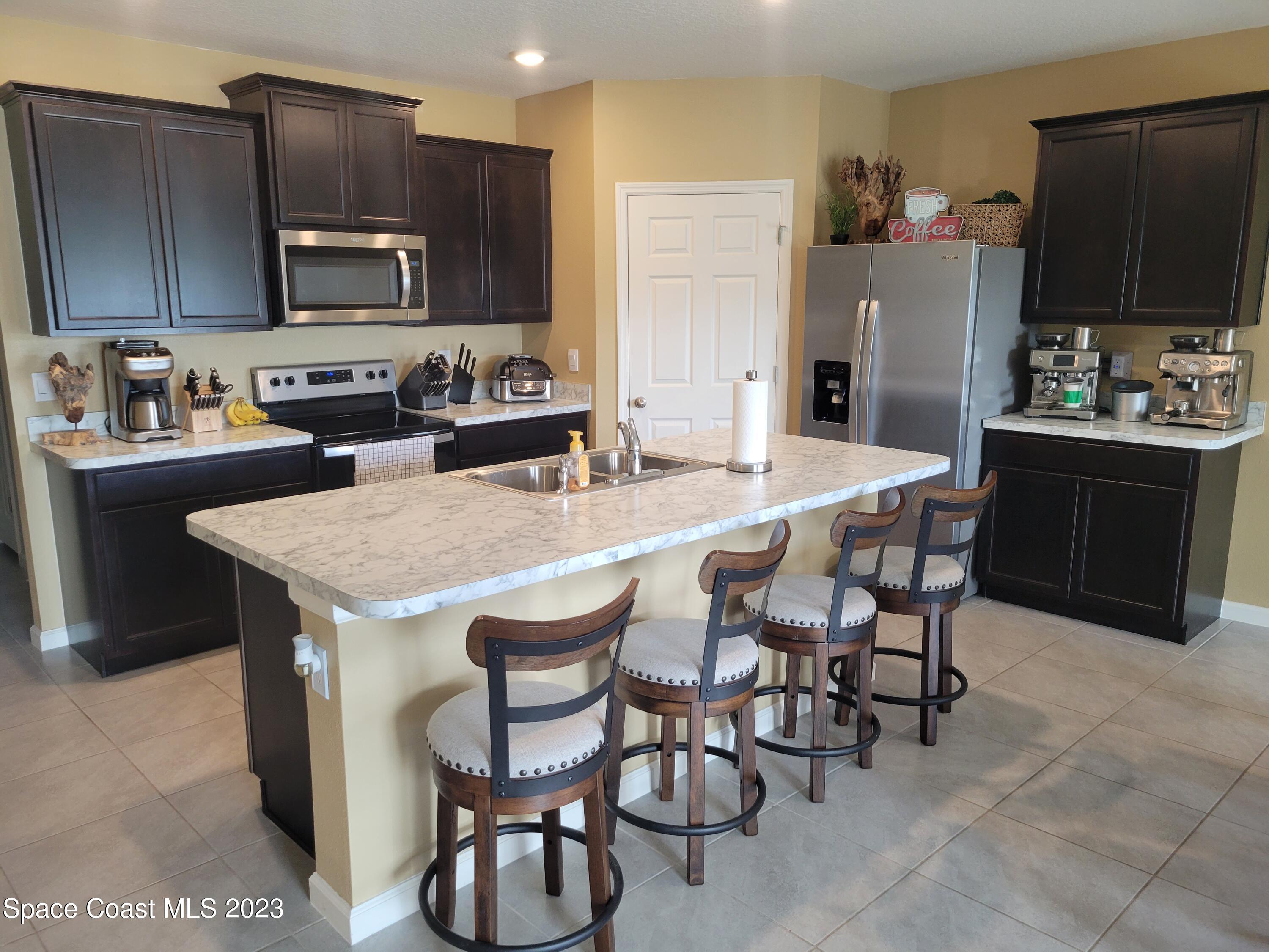 320 Godfrey Road Southeast Palm Bay, FL 32909 - Photo 4 of 21 GORGEOUS KITCHEN WITH WALK-IN PANTRY!