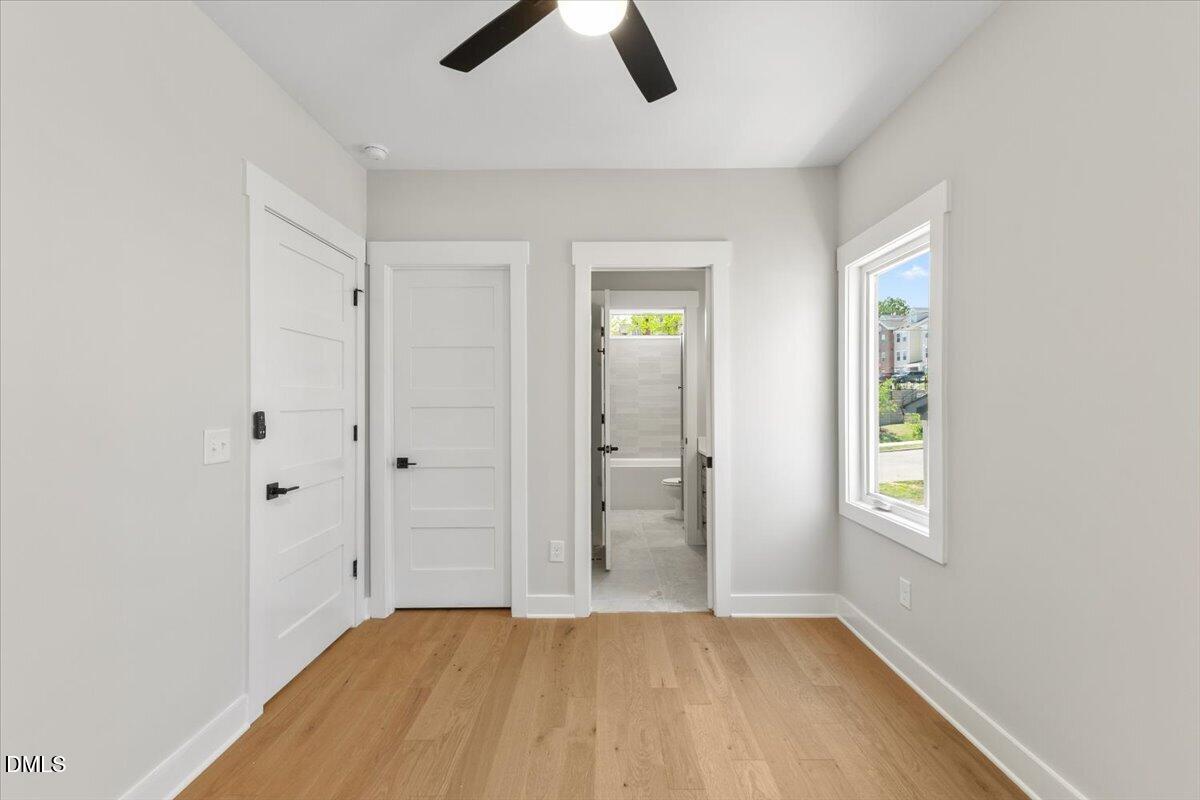 541 Bragg Street Raleigh, NC 27601 - Photo 28 of 44 an empty room with closet and windows