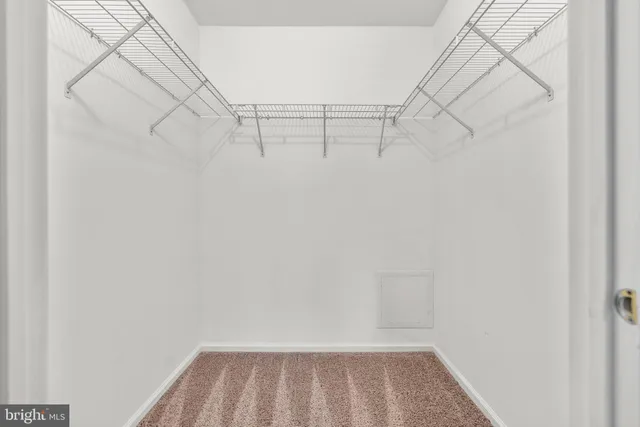 a view of a room with racks on the wall