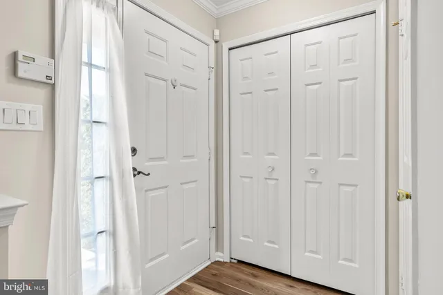 a view of a elevator and front door