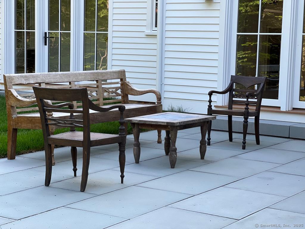 Undisclosed Address Litchfield, CT 06759 - Photo 12 of 22 a view of a house with backyard and sitting area