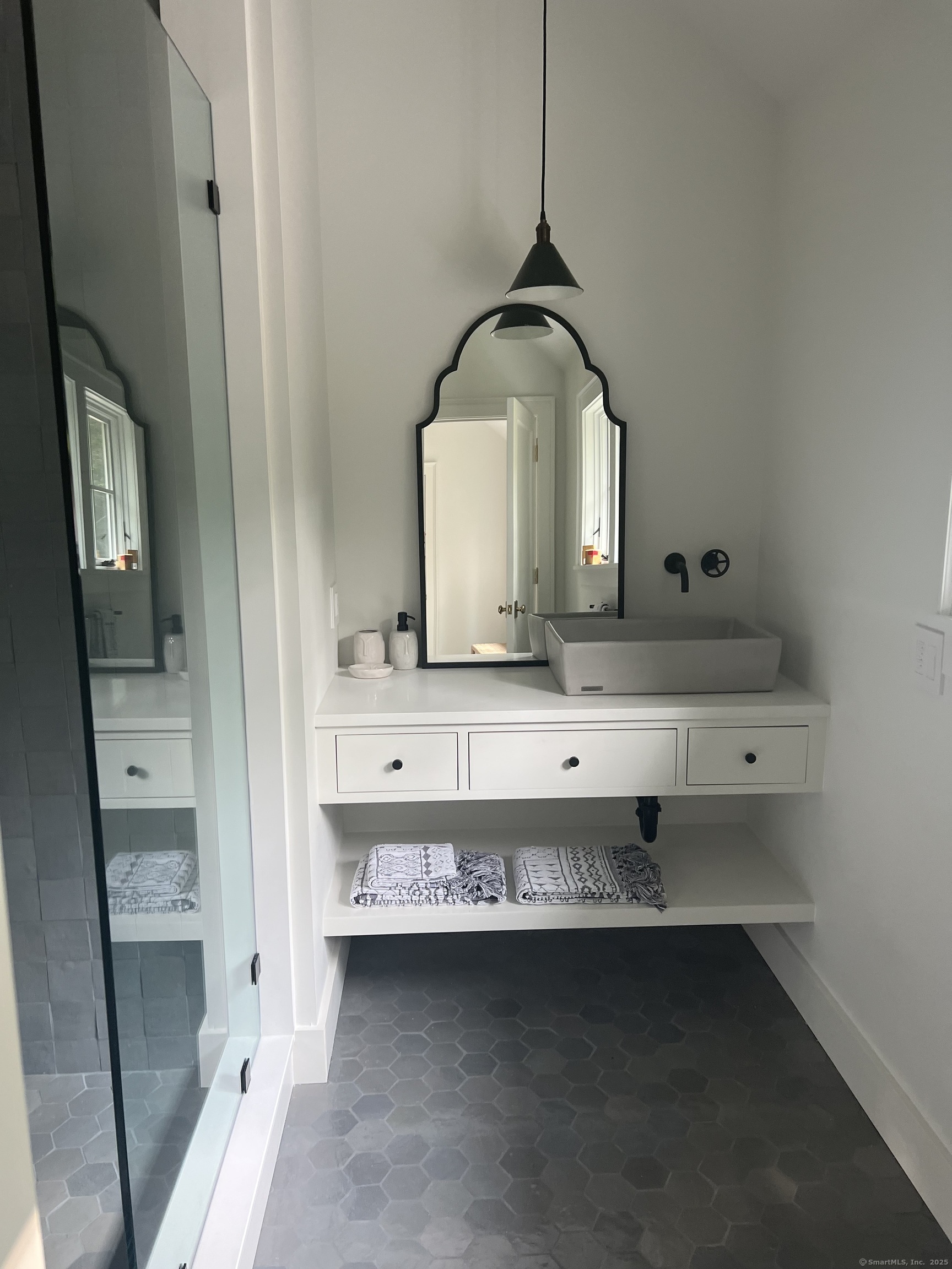 Undisclosed Address Litchfield, CT 06759 - Photo 13 of 22 a bathroom with a sink and a mirror