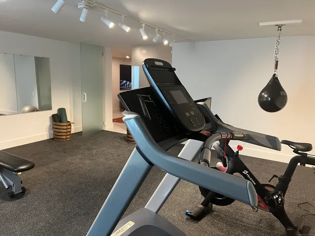 a view of a room with gym equipment