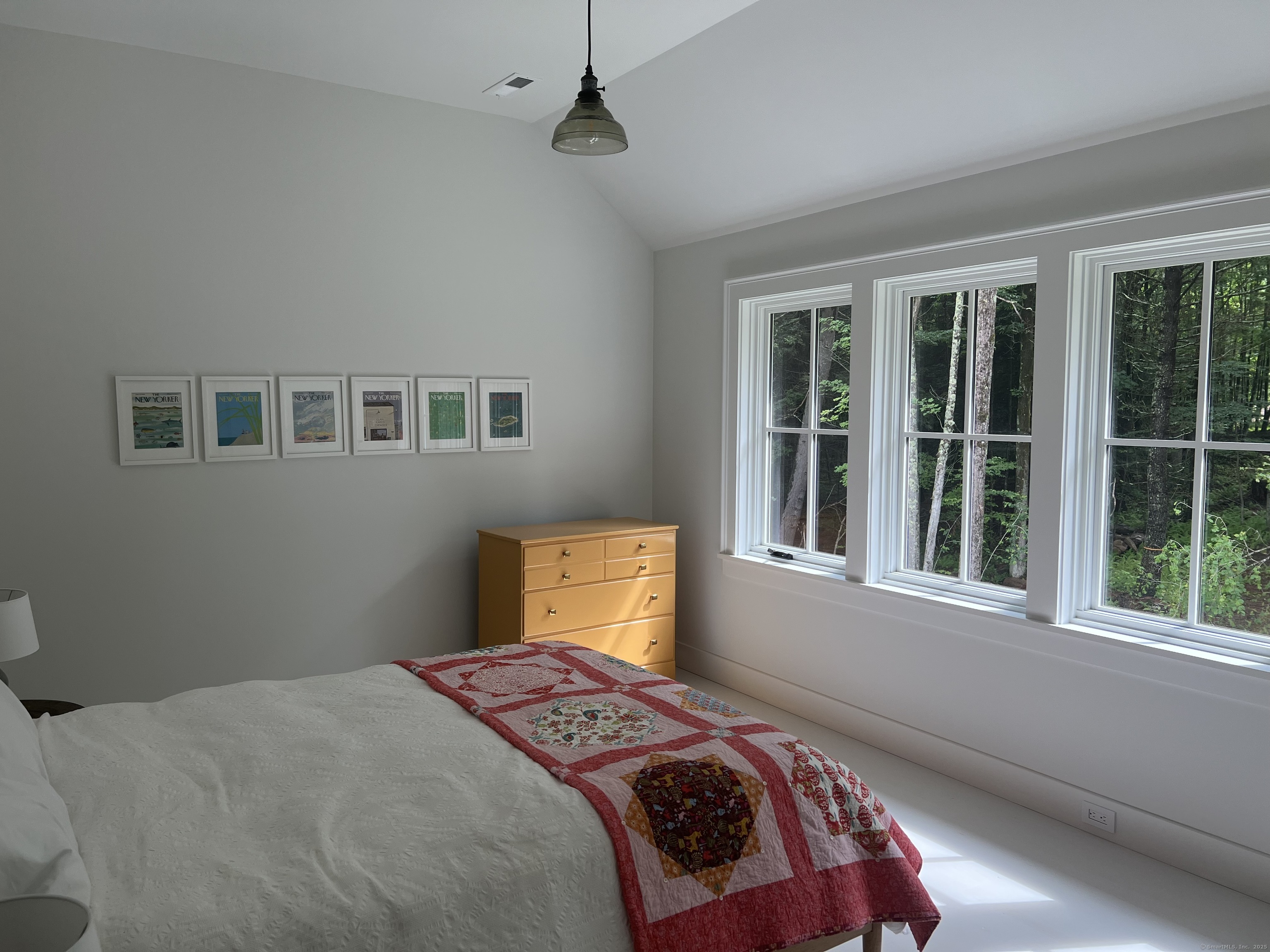 Undisclosed Address Litchfield, CT 06759 - Photo 15 of 22 a bedroom with a bed and a window