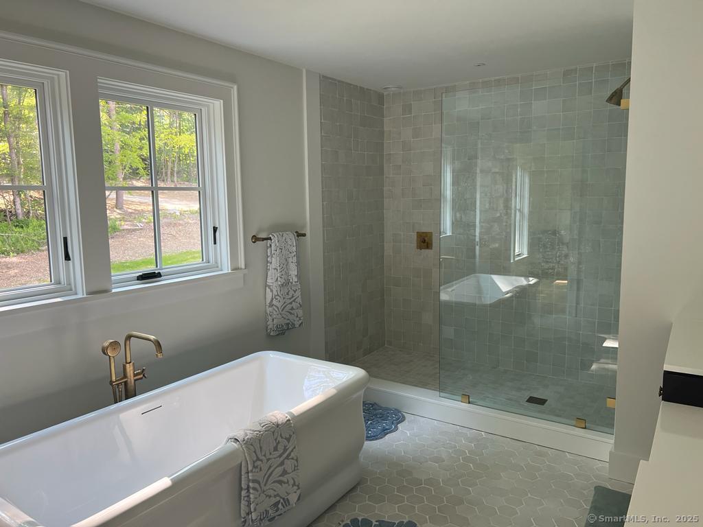 Undisclosed Address Litchfield, CT 06759 - Photo 18 of 22 a bathroom with a bathtub and shower
