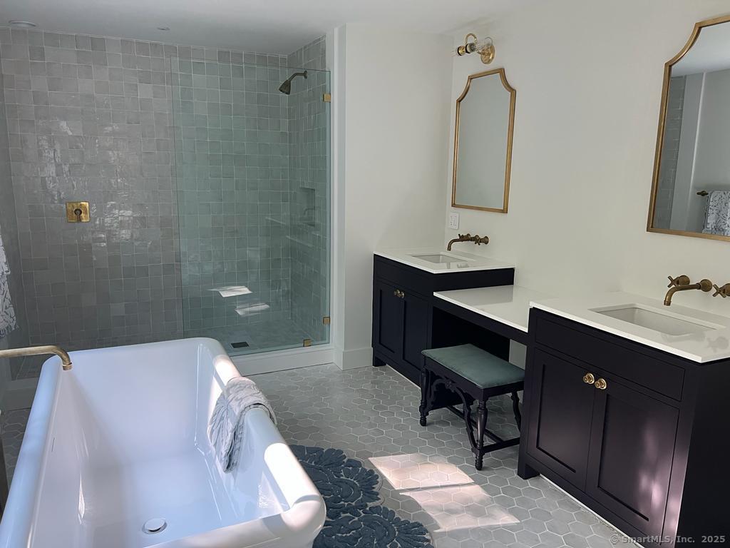 Undisclosed Address Litchfield, CT 06759 - Photo 20 of 22 a bathroom with a sink and a mirror