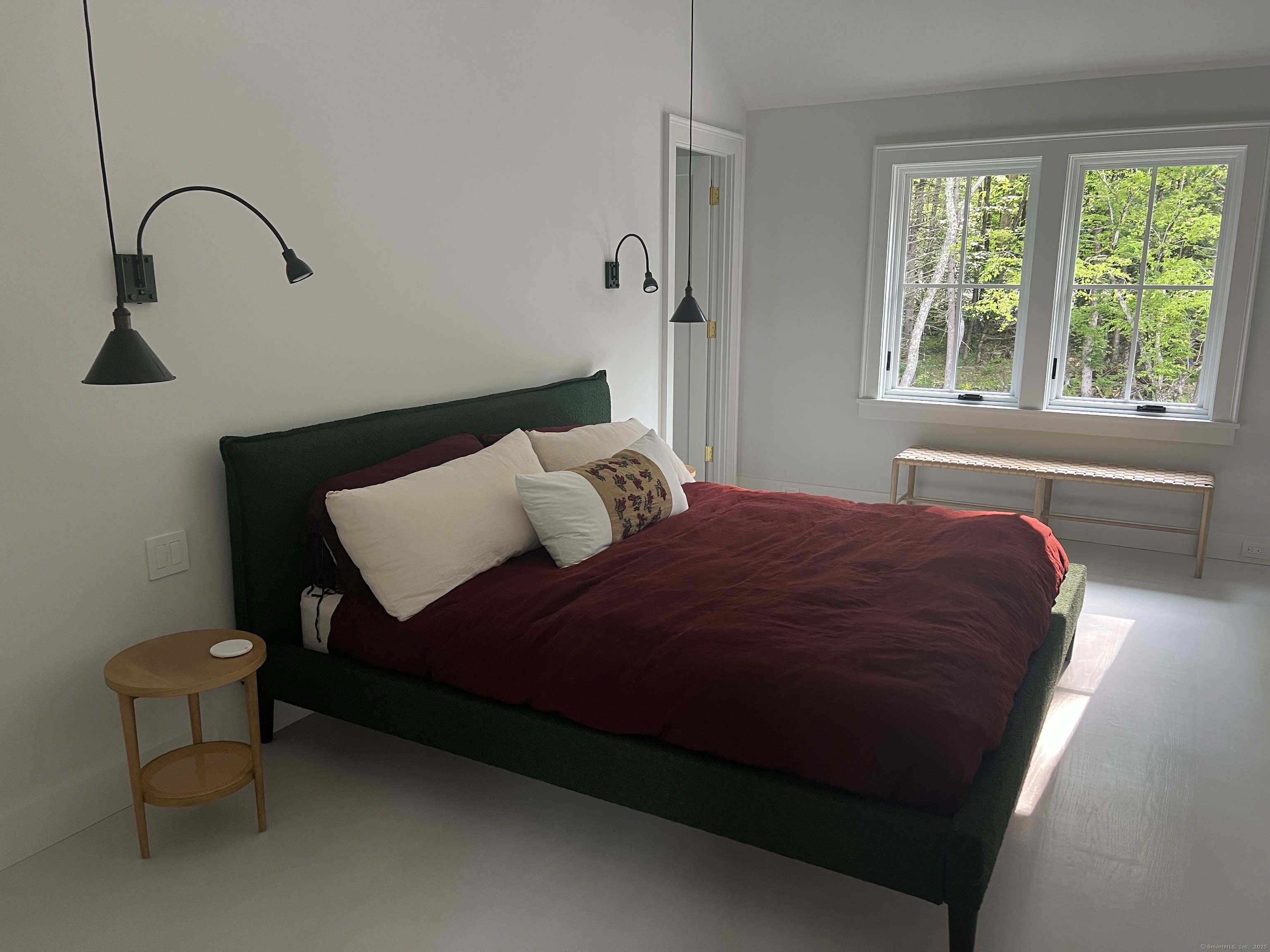 Undisclosed Address Litchfield, CT 06759 - Photo 8 of 22 a bedroom with a bed and a window