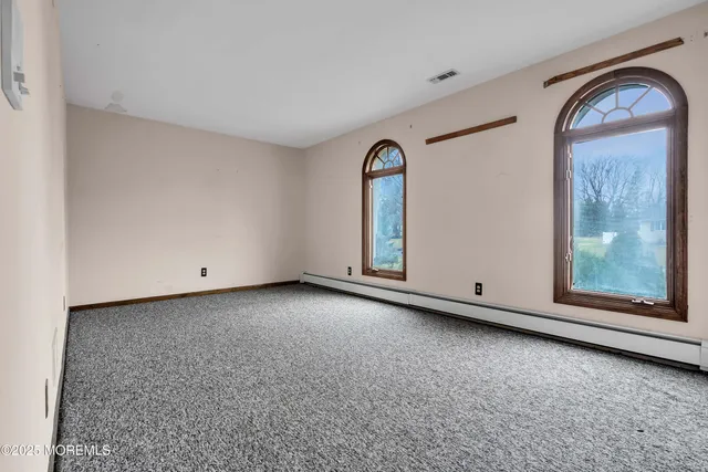 a view of a room with an entryway