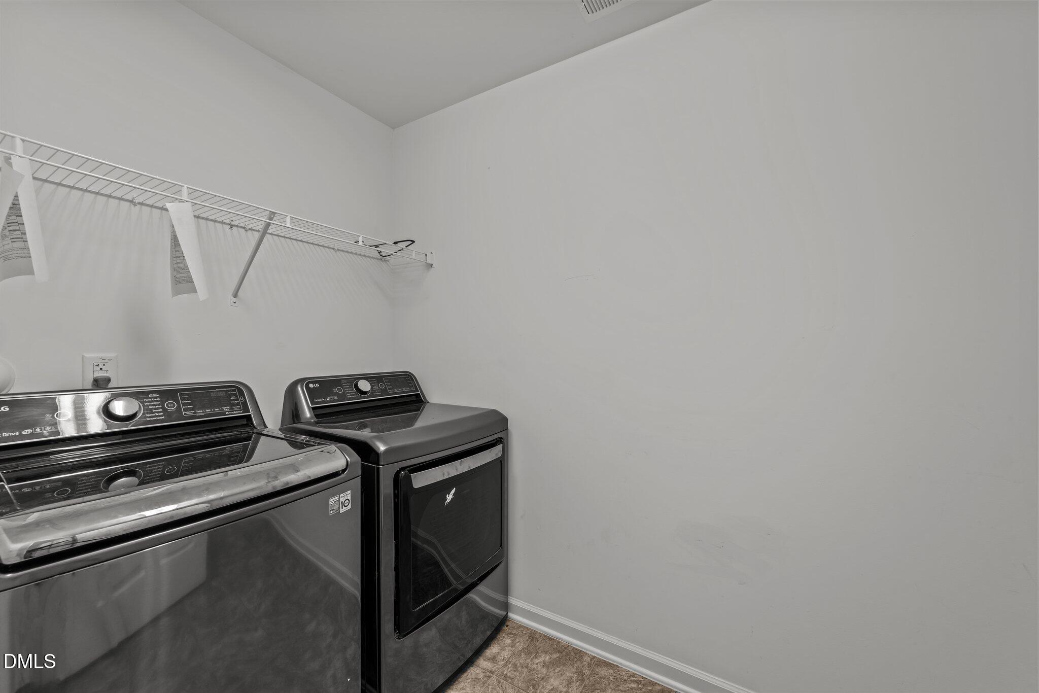 1445 Lombar Street Raleigh, NC 27610 - Photo 11 of 20 a utility room with dryer and washer