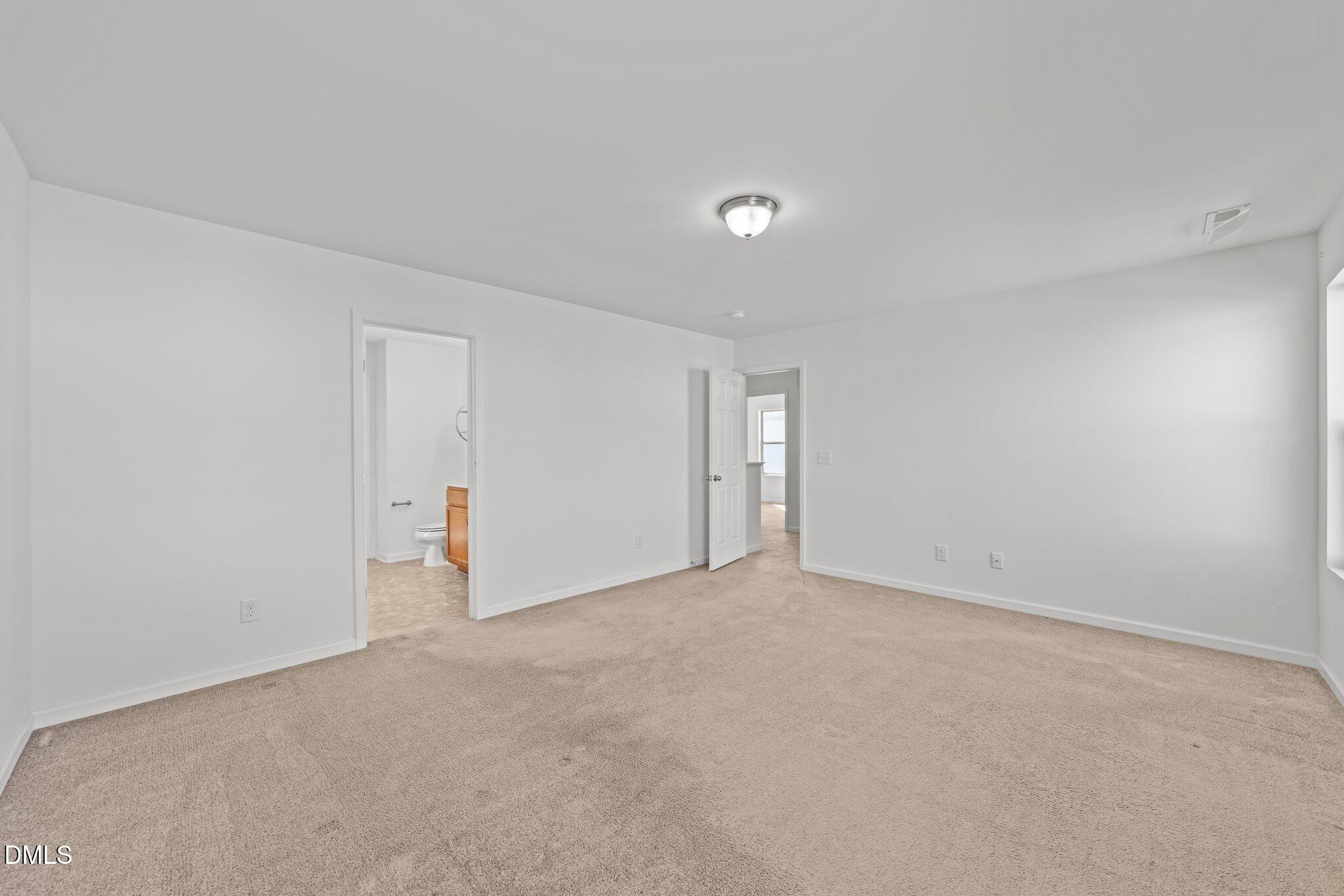 1445 Lombar Street Raleigh, NC 27610 - Photo 17 of 20 an empty room with an entryway