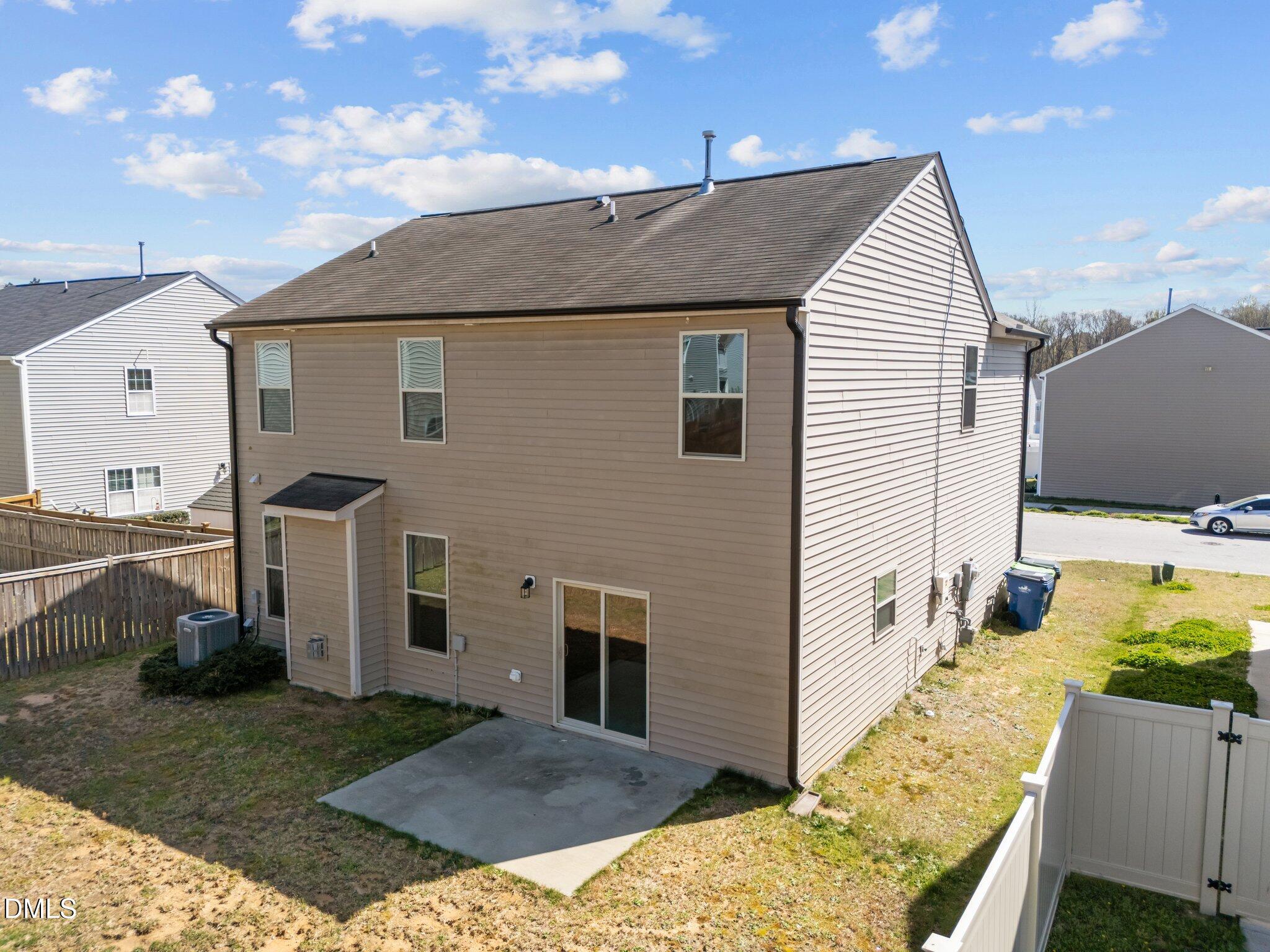 1445 Lombar Street Raleigh, NC 27610 - Photo 20 of 20 a aerial view of a house with a yard