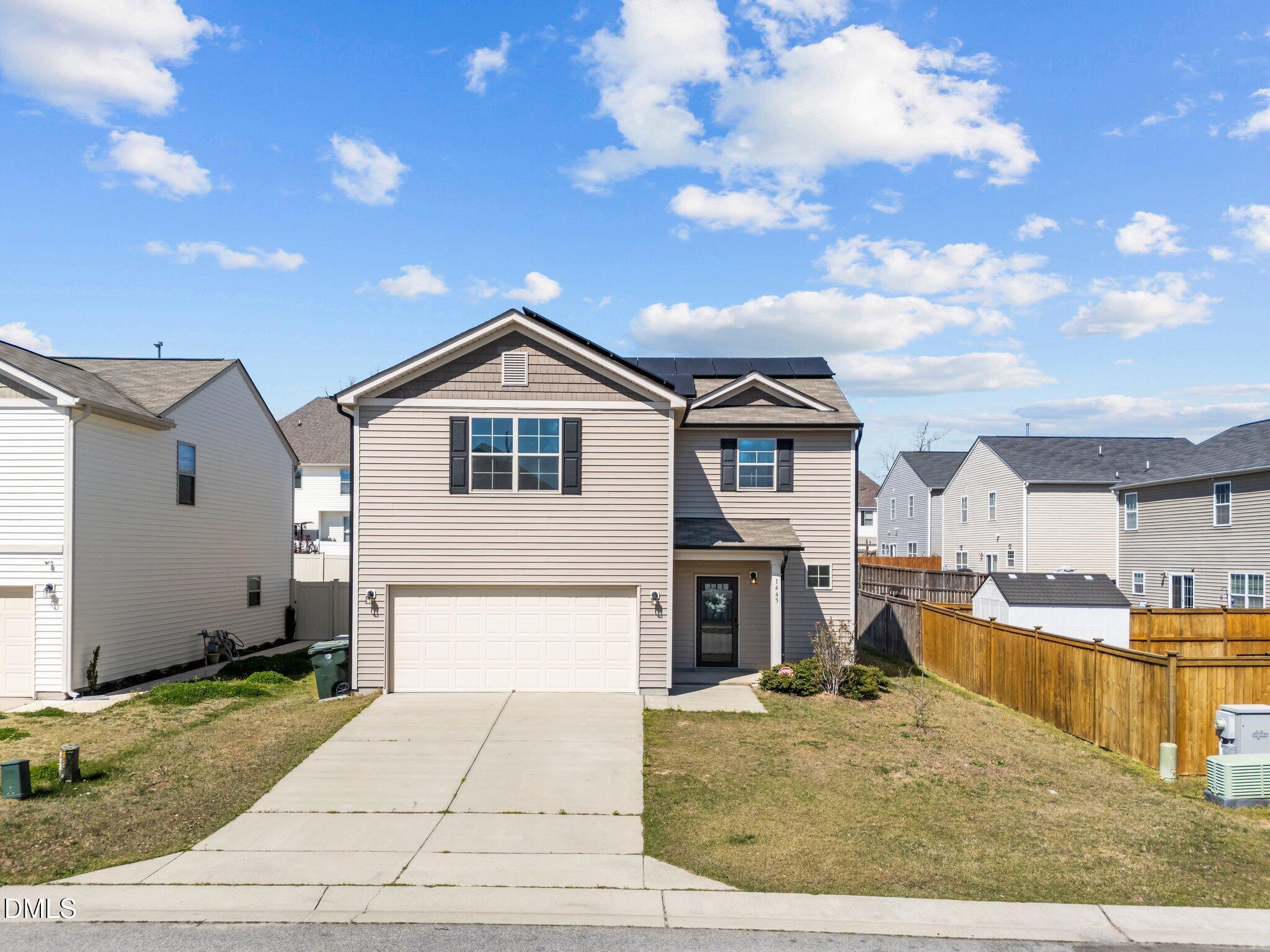 1445 Lombar Street Raleigh, NC 27610 - Photo 2 of 20 a view of a house with entertaining space
