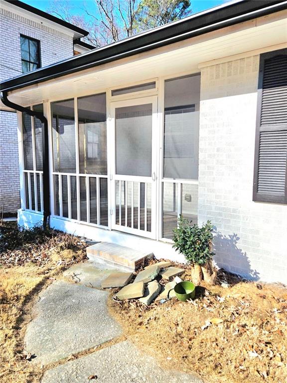 522 Wimbledon Road Northeast Atlanta, GA 30324 - Photo 15 of 15 a view of a entryway door front of house