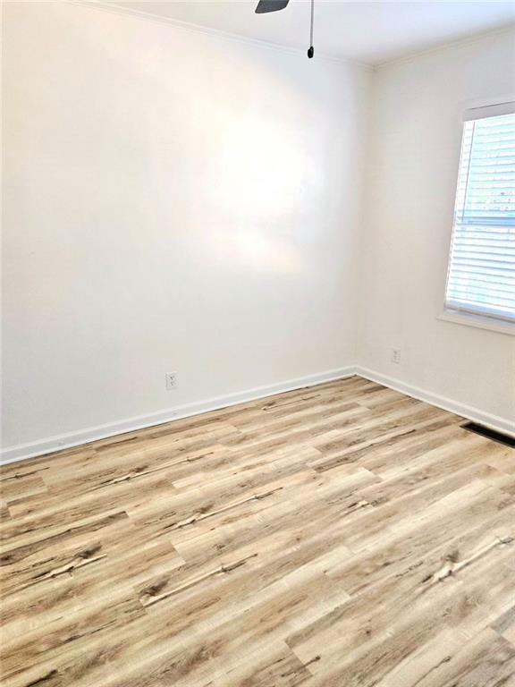 522 Wimbledon Road Northeast Atlanta, GA 30324 - Photo 6 of 15 a view of empty room with wooden floor