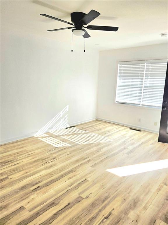 522 Wimbledon Road Northeast Atlanta, GA 30324 - Photo 9 of 15 a view of a room with a ceiling fan