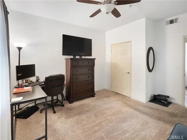 a room with furniture and flat screen tv
