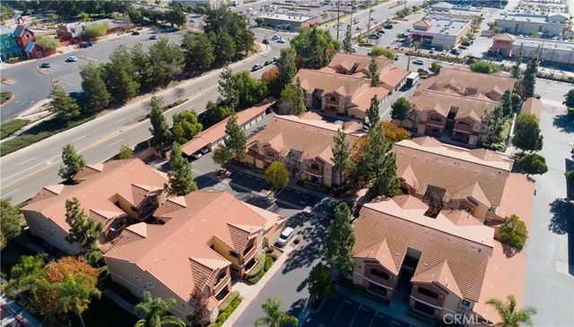 an aerial view of a houses with outdoor space