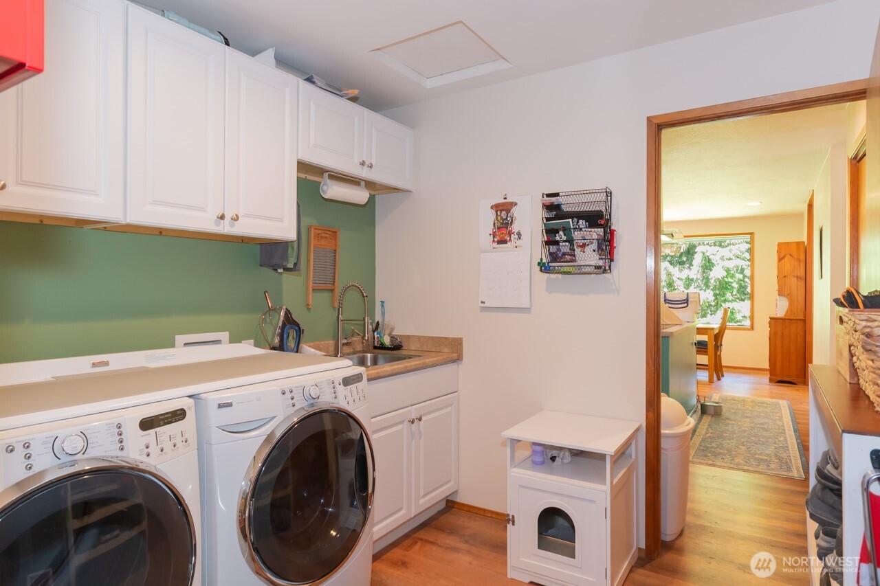 492 Walkabout Way Port Angeles, WA 98363 - Photo 18 of 40 a utility room with dryer and washer