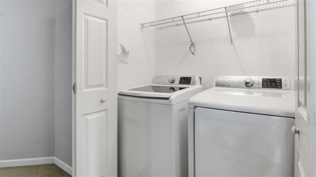 3522 Spring View Court Alpharetta, GA 30004 - Photo 15 of 25 a utility room with dryer and washer