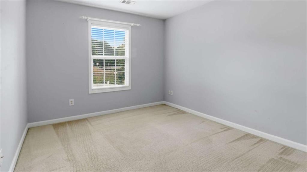 3522 Spring View Court Alpharetta, GA 30004 - Photo 17 of 25 an empty room with a window