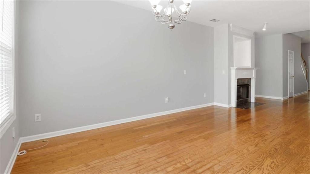 3522 Spring View Court Alpharetta, GA 30004 - Photo 20 of 25 a view of a livingroom with wooden floor
