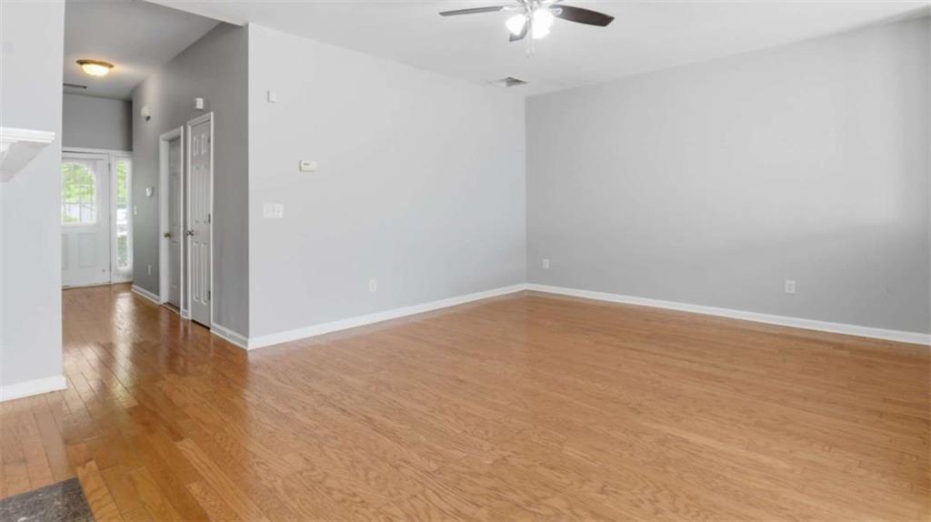 3522 Spring View Court Alpharetta, GA 30004 - Photo 21 of 25 wooden floor in an empty room