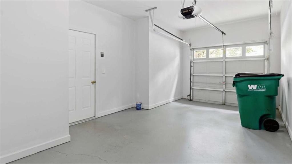 3522 Spring View Court Alpharetta, GA 30004 - Photo 22 of 25 an empty room with windows and fireplace