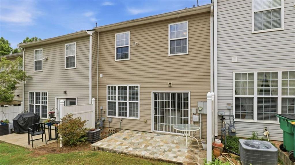 3522 Spring View Court Alpharetta, GA 30004 - Photo 23 of 25 a front view of a house with a yard