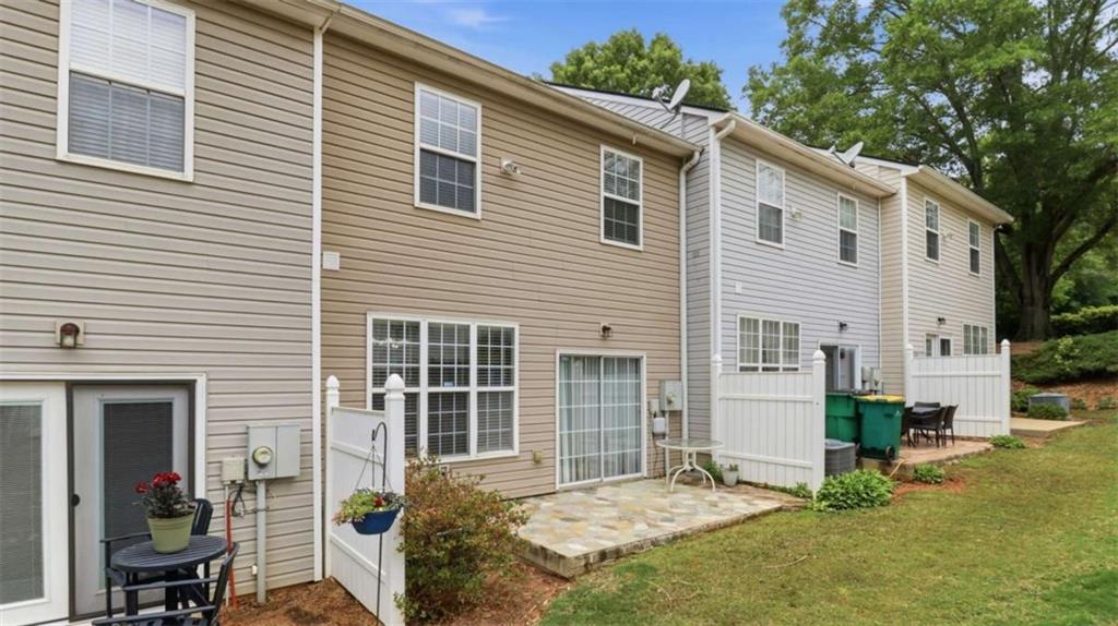 3522 Spring View Court Alpharetta, GA 30004 - Photo 24 of 25 a view of backyard with a small cabin and a chair