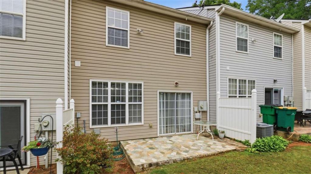 3522 Spring View Court Alpharetta, GA 30004 - Photo 25 of 25 a front view of a house with a yard