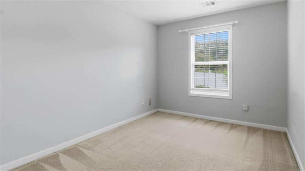 3522 Spring View Court Alpharetta, GA 30004 - Photo 8 of 25 an empty room with a window