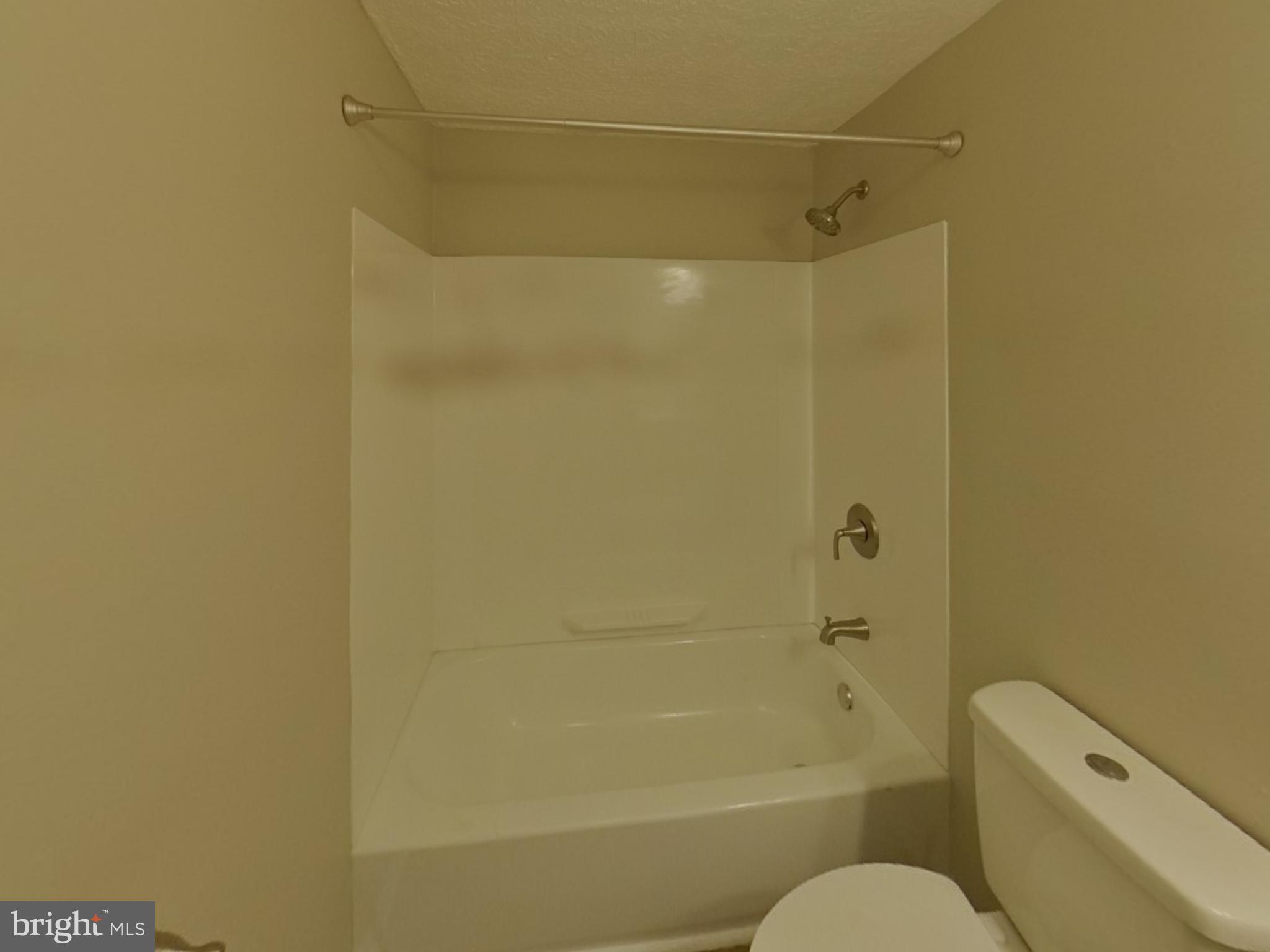 3776 Timahoe Circle Baltimore, MD 21236 - Photo 12 of 16 a bathroom with a shower and toilet