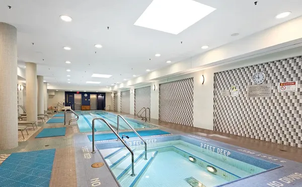 a room with lots of tables and chairs